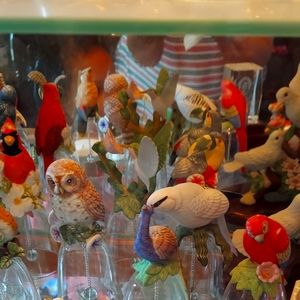 Set of bells with birdson top